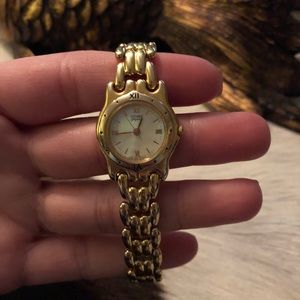 Small gold citizen watch